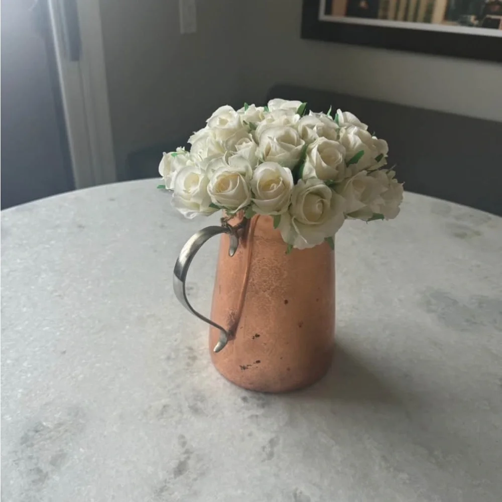Elegant Copper Vase with White Roses